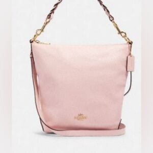 Coach shoulder bag with rose bouquet print interior